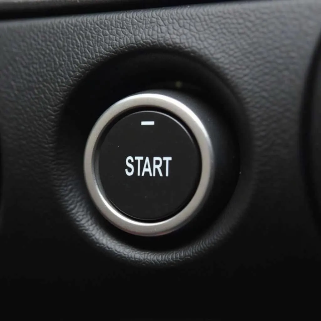 Car ignition with key turned to the start position