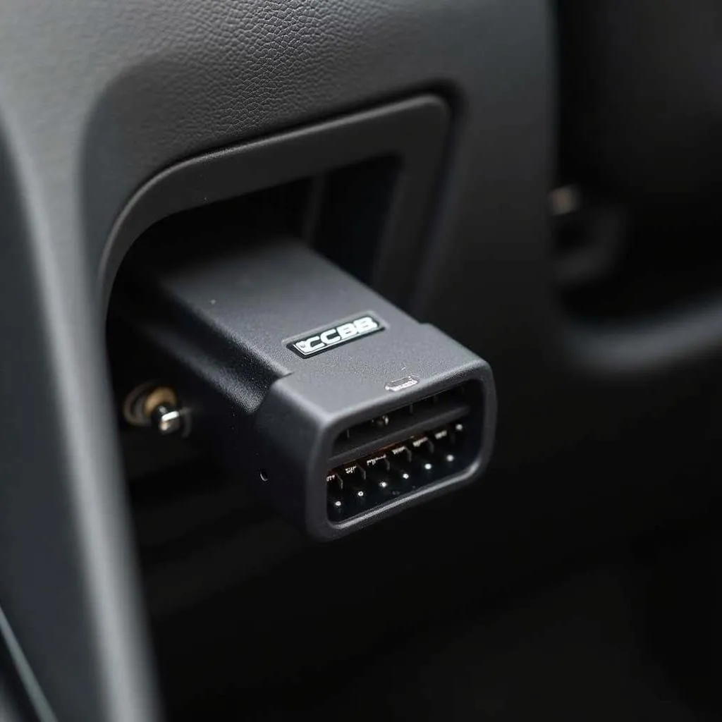 Cobb Accessport connected to car's OBD port