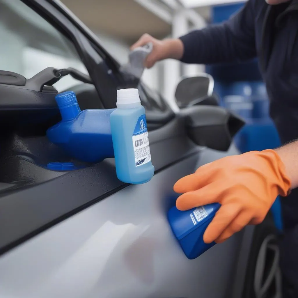 Person refilling AdBlue tank of a Peugeot 3008