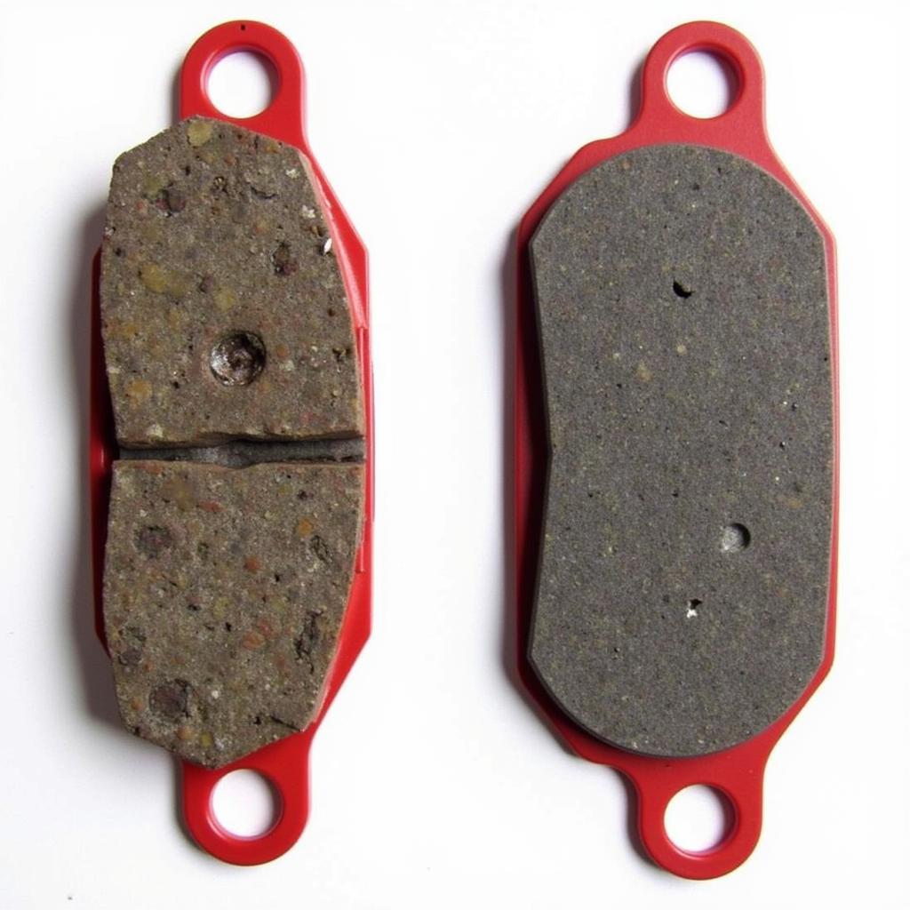 Close-up of a worn brake pad on an Audi A4