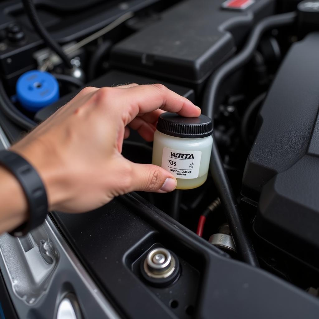 Mechanic Checking Brake Fluid Level in Car