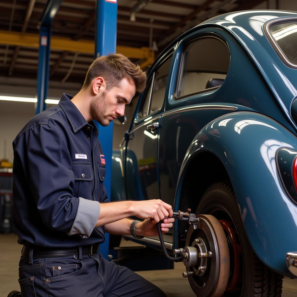 Mechanic Inspecting VW Beetle Brake System