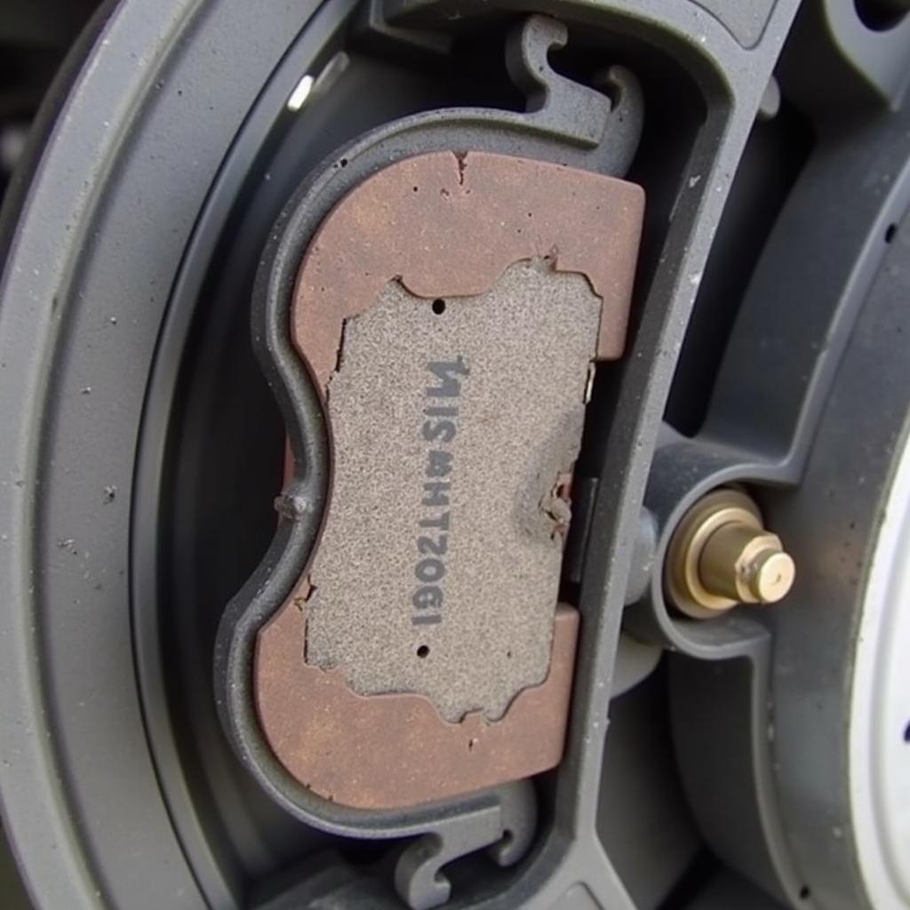 Inspecting Worn Brake Pads on a 2006 Audi A4