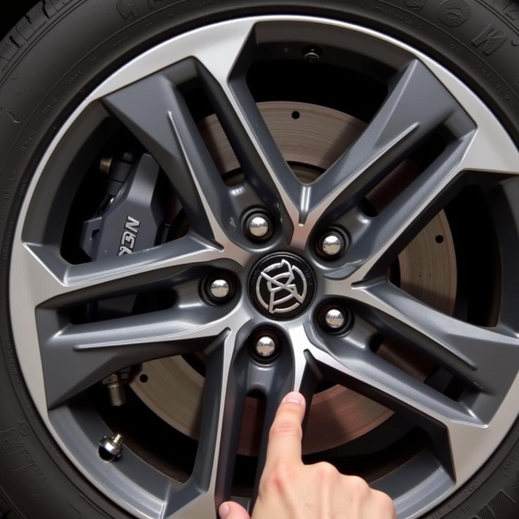 Inspecting Brake Pads on a 2016 Toyota Camry