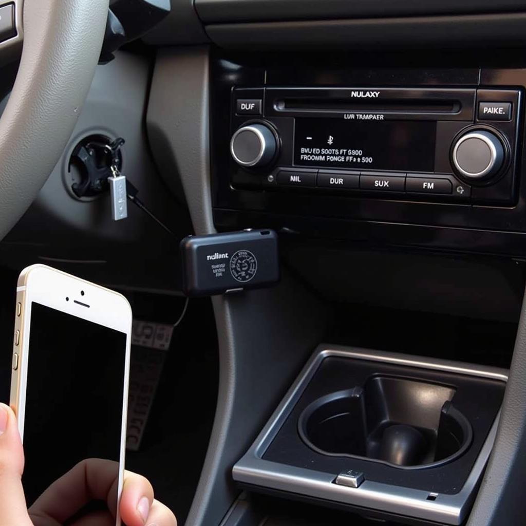 Nulaxy Bluetooth FM Transmitter connected to a car's 12V power outlet and paired with a smartphone.